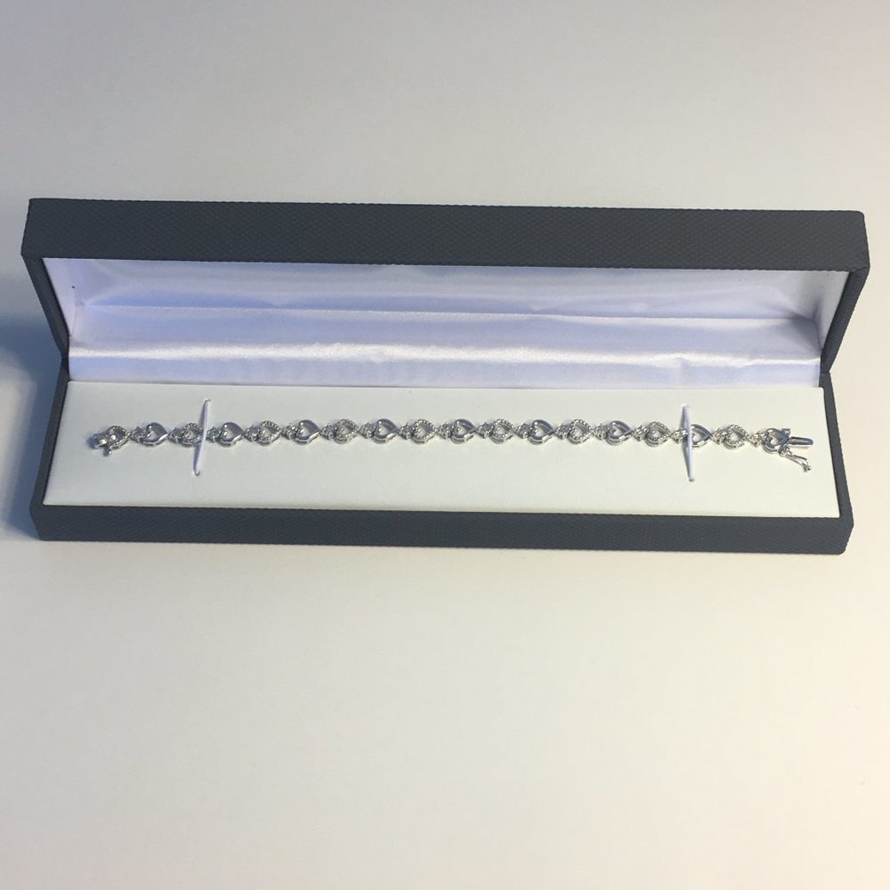 1/10 CT. T.W. White Diamond Heart Tennis Bracelet - Picture 2 of 9
